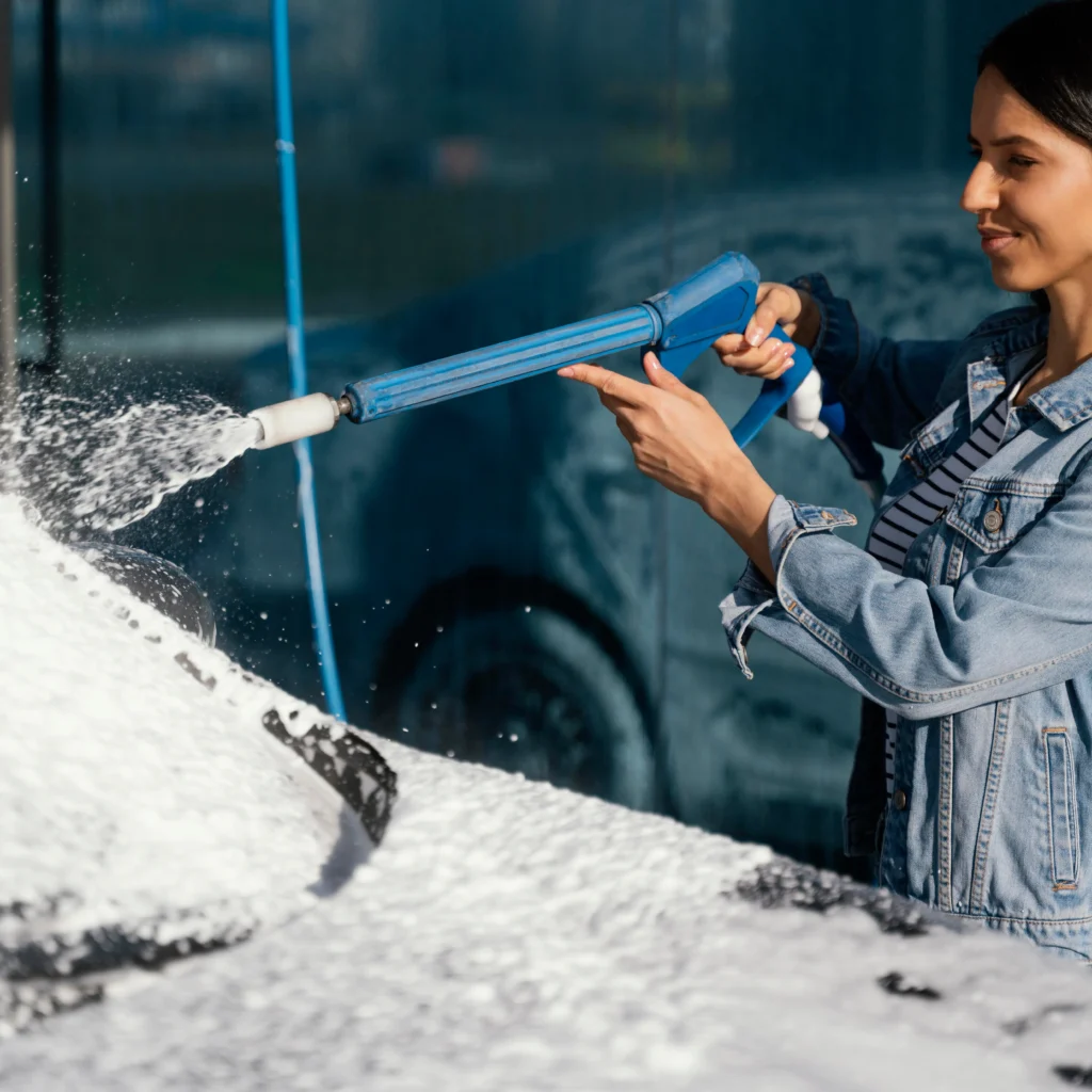 Woman washing car